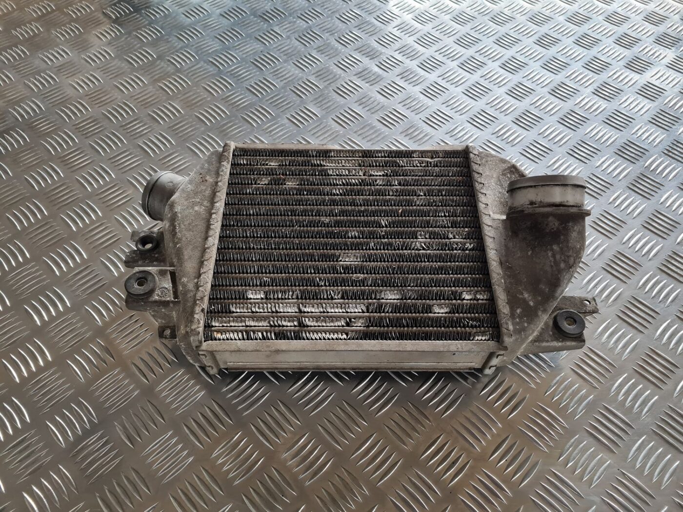 Interkūleris priekš SUBARU LEGACY 2010 1 Interkūleris priekš SUBARU LEGACY 2010